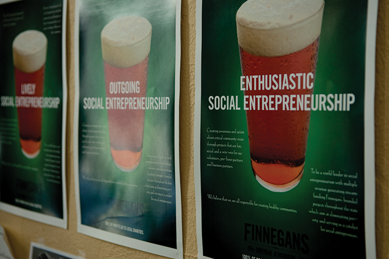 Finnegans posters on a wall.